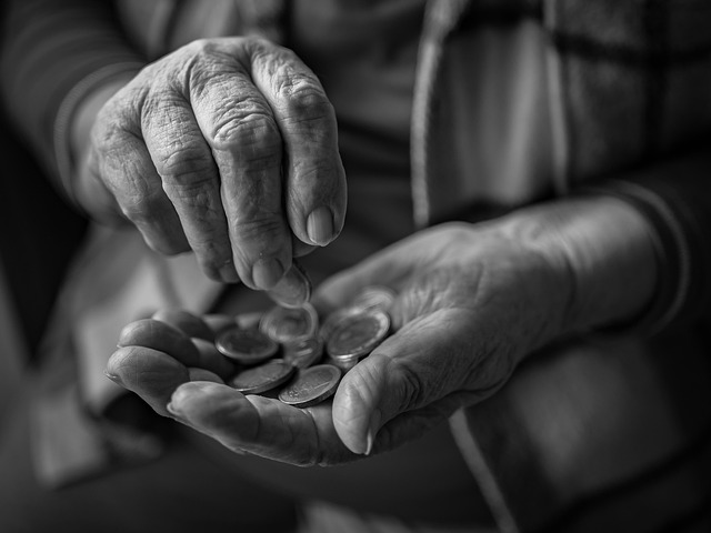 consultant reviewing pension documents and timeline planning